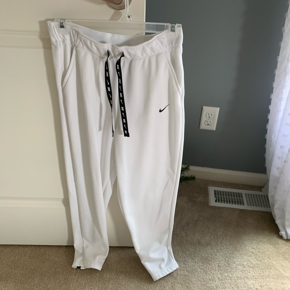 white nike sweatpants with zippers